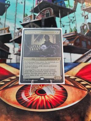 Scheming Fence (Showcase) (Foil Etched) - Streets of New Capenna